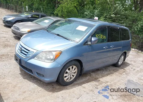 2010 Honda Odyssey Ex-L z USA, uszkodzony, nr VIN 5FNRL3H73AB074422